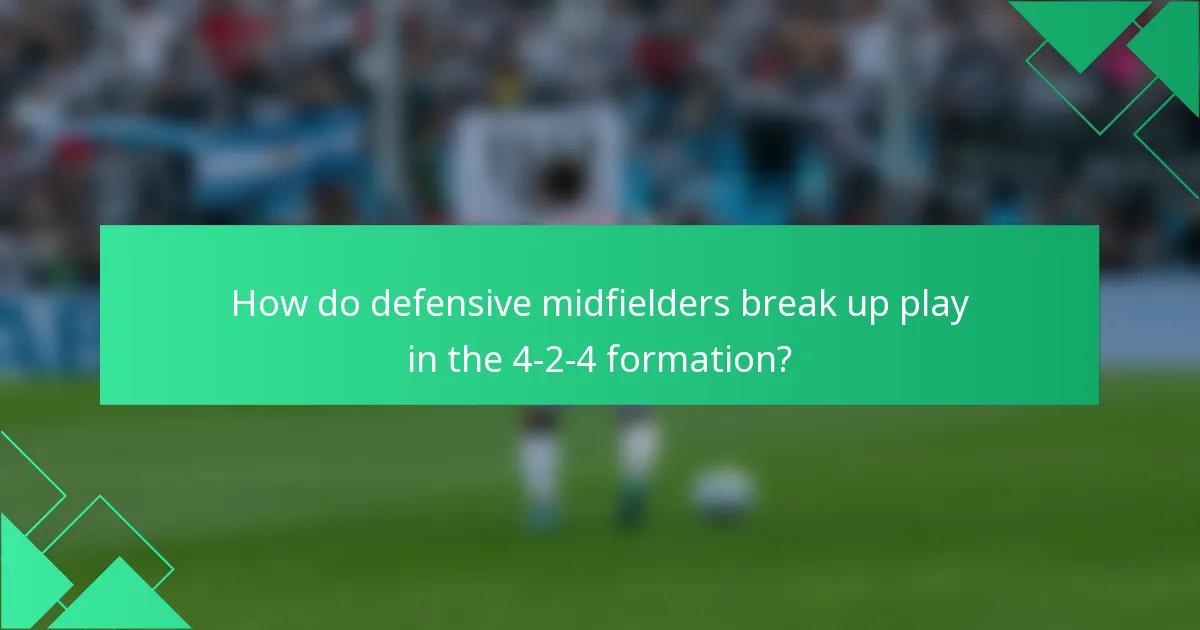 How do defensive midfielders break up play in the 4-2-4 formation?