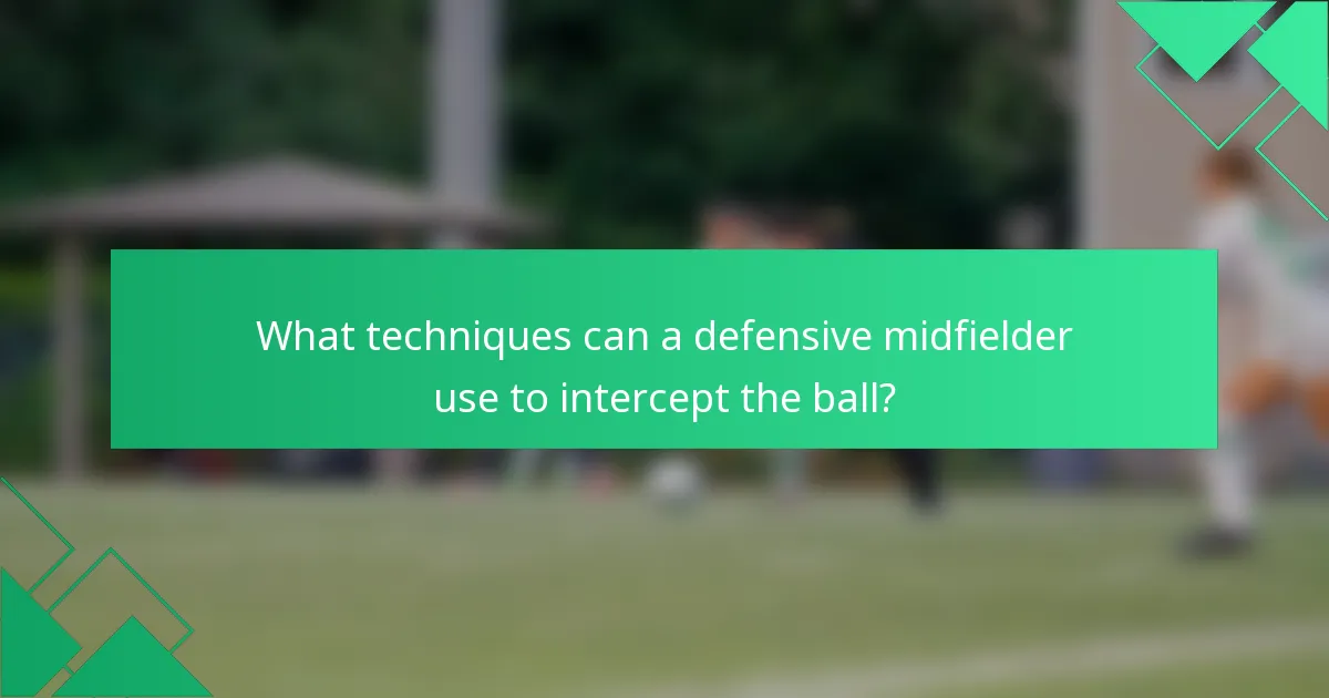 What techniques can a defensive midfielder use to intercept the ball?